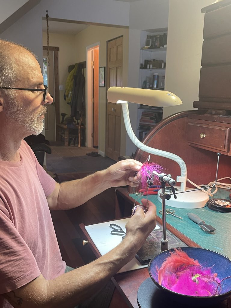 Al Ducros works at creating fishing lures